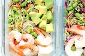 containers with spicy slaw bowls with shrimp & edamame