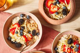a recipe photo of the Bircher Muesli served in bowls with berries