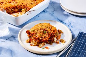 Cabbage Roll Casserole on a plate with casserole dish in background
