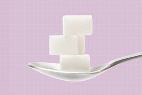 a photo of 3 sugar cubes on a tablespoon