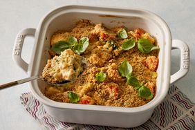 Cheesy vegetable bake recipe in a white square baking dish