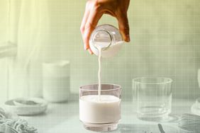 a photo of someone pouring milk into a glass
