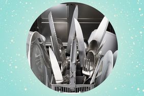 a photo of an utensils basket in a dishwasher including multiple knives