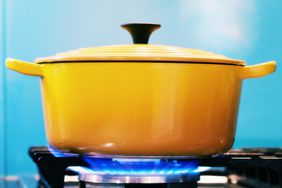 a photo of a pot on a gas stove top