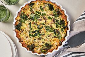 Overhead view of a baking dish of Spinach & Mushroom Quiche recipe